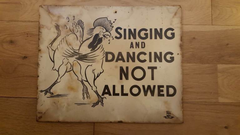 thorben singing and dancing not allowed metal tin sign 11 inches long 9 inches high used