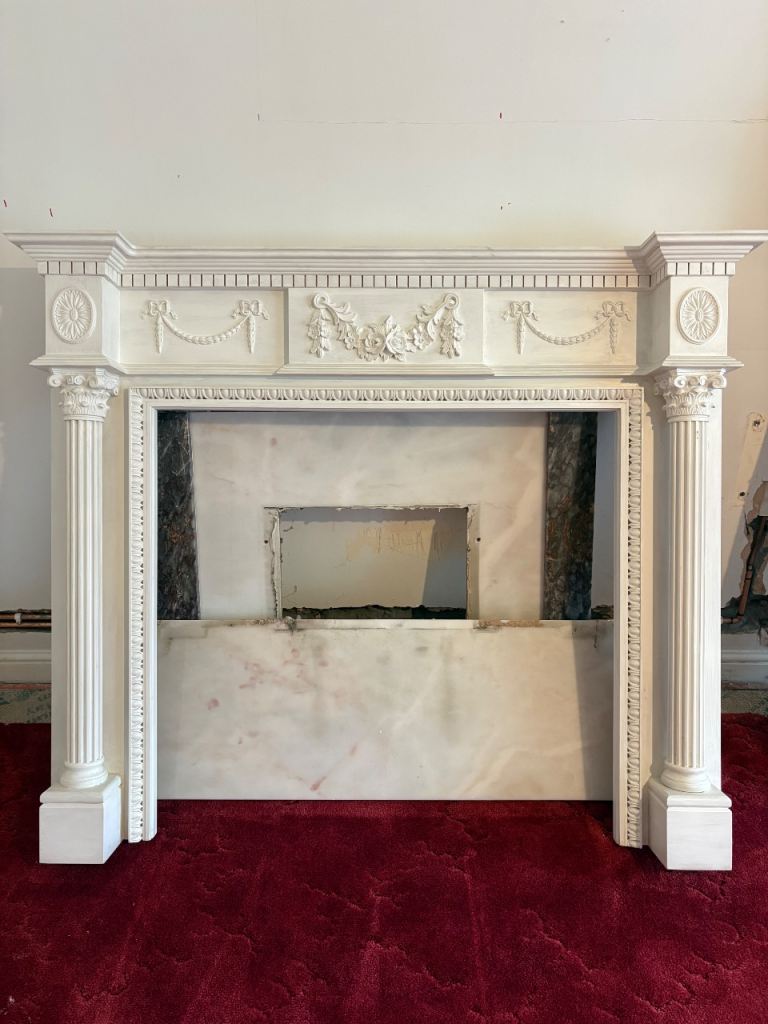 Wooden fireplace and marble surround. Free!