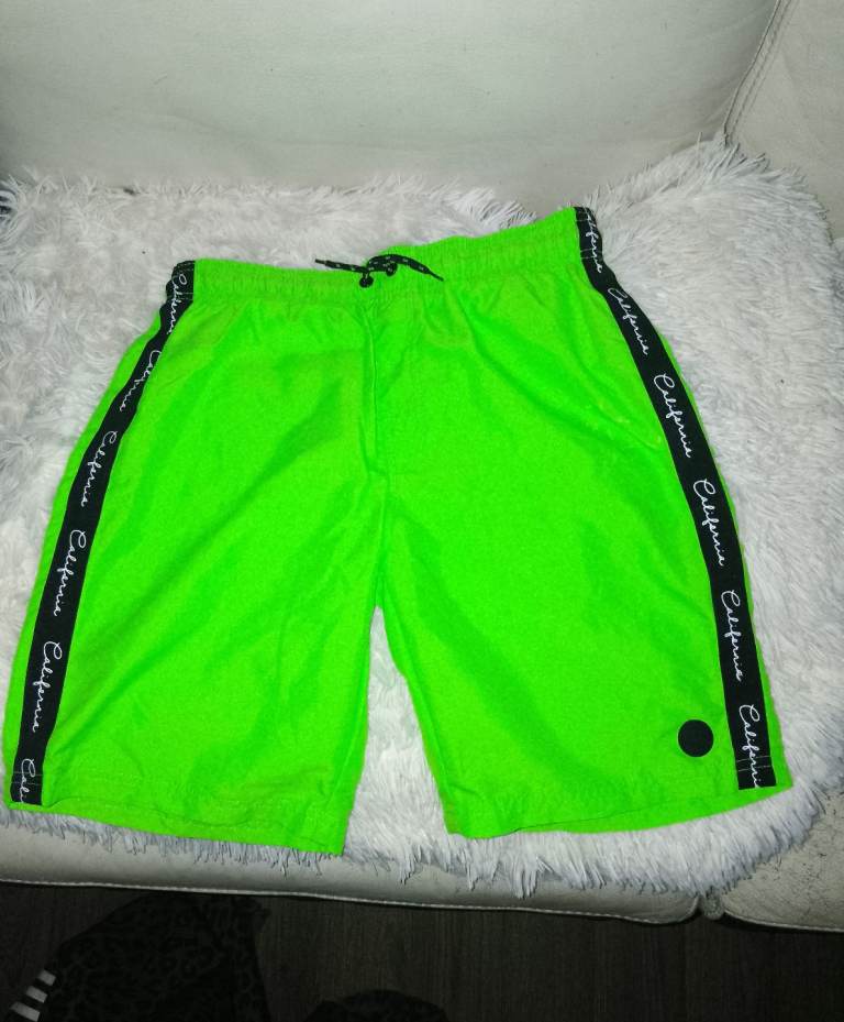 Boys green swimming shorts new 12-13