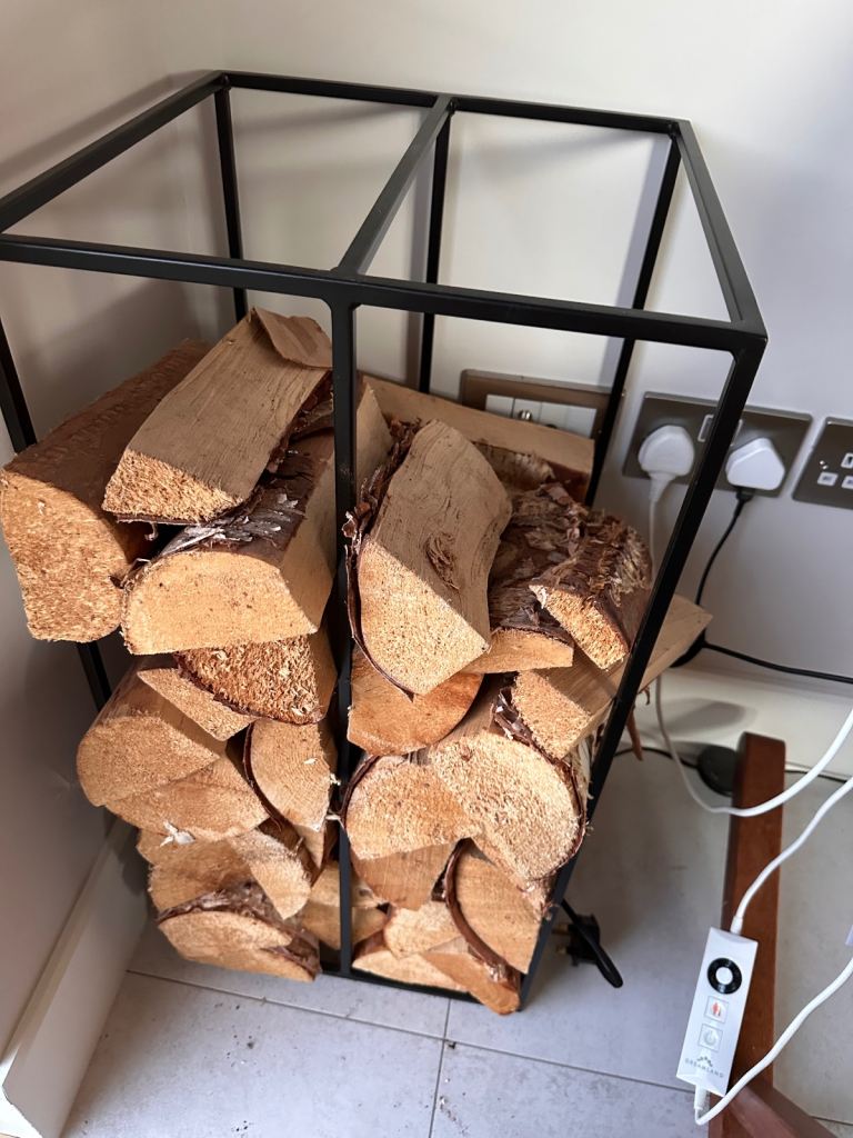 Indoor wood burner Log store