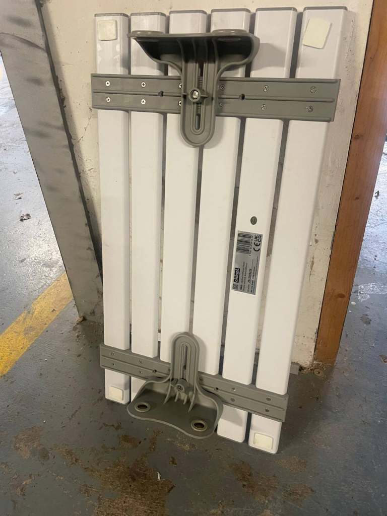 FREE adjustable bath seat - unused