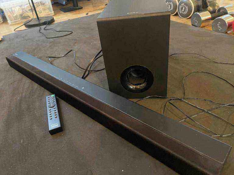 Sony TV PC laptop Phone Soundbar and a subwoofer