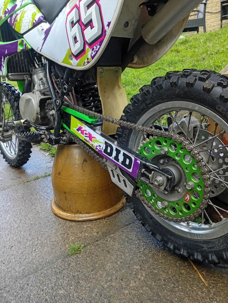KX Dirt Bike 65 – Green/Purple, Good Condition