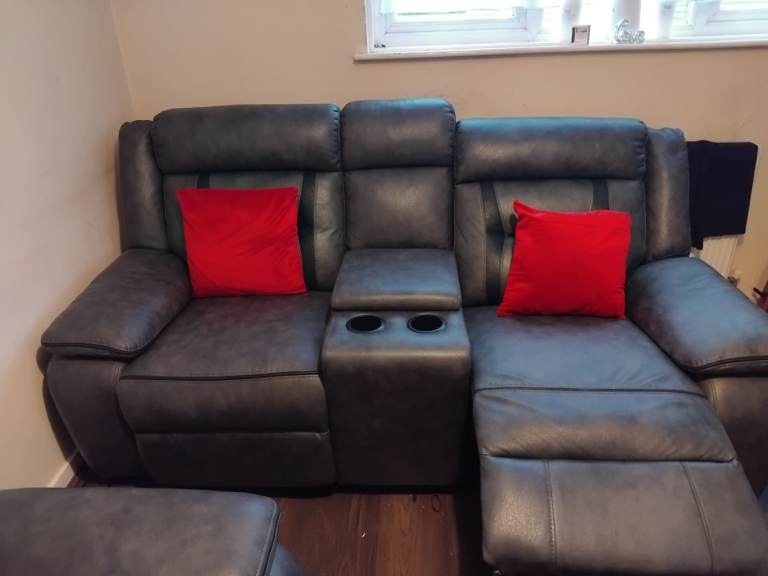  2 Seated Grey leather Recliner sofa..