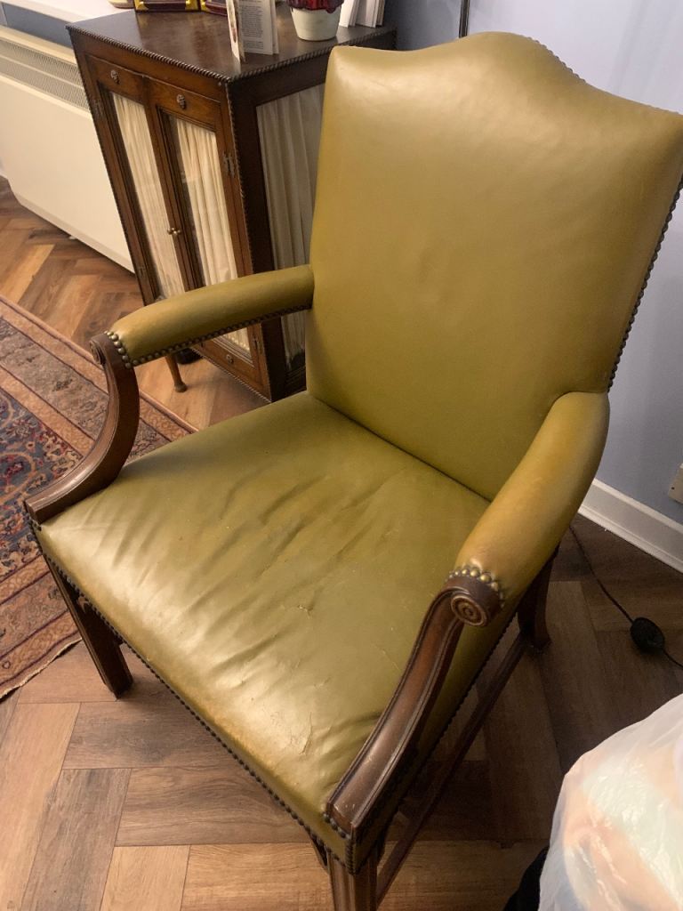 Leather antique brass studded chair proceeds to charity 