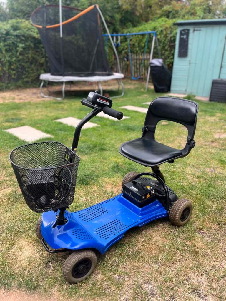 Compact Blue Mobility Scooter with Basket – Good Condition