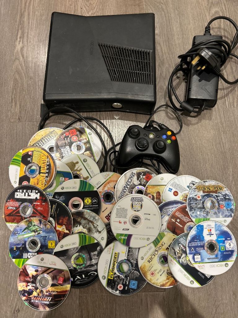 Xbox 360 Slim with 20+ game discs 
