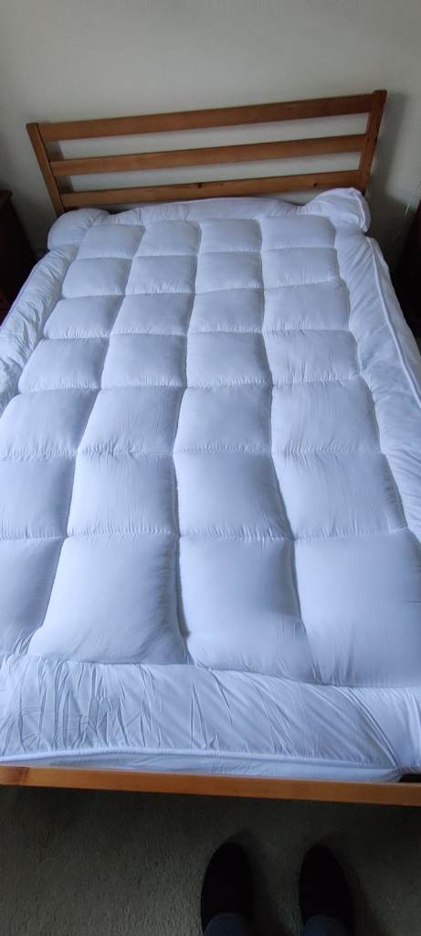 Small double bed with mattress topper 