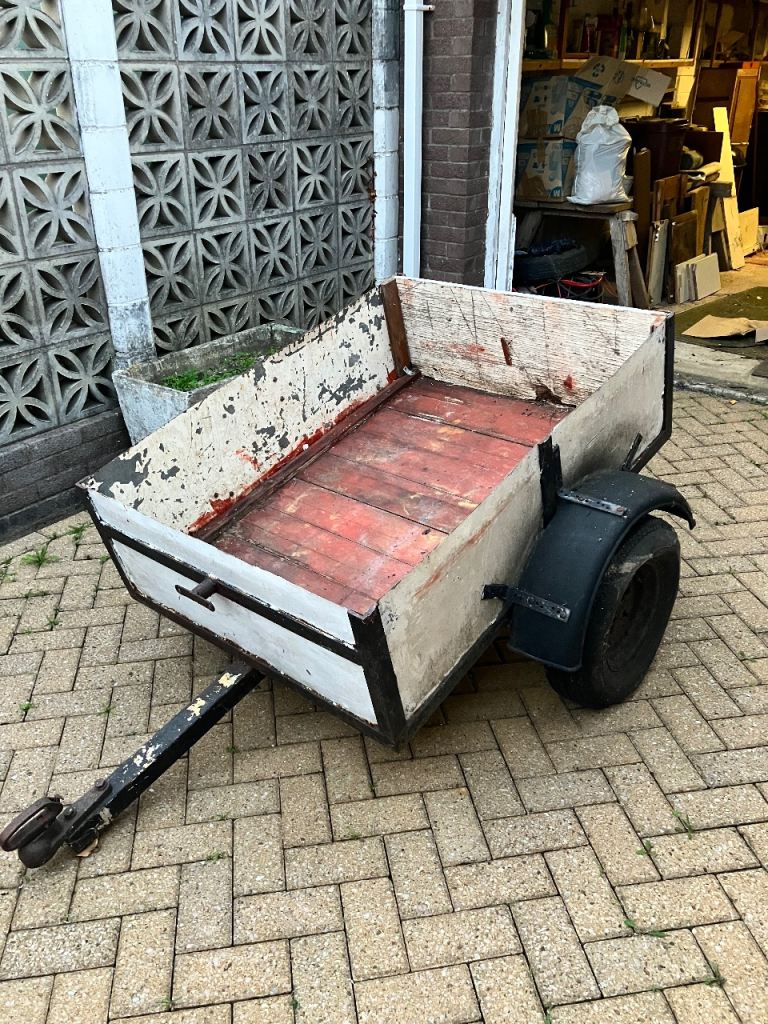 Free Small trailer with cover. 