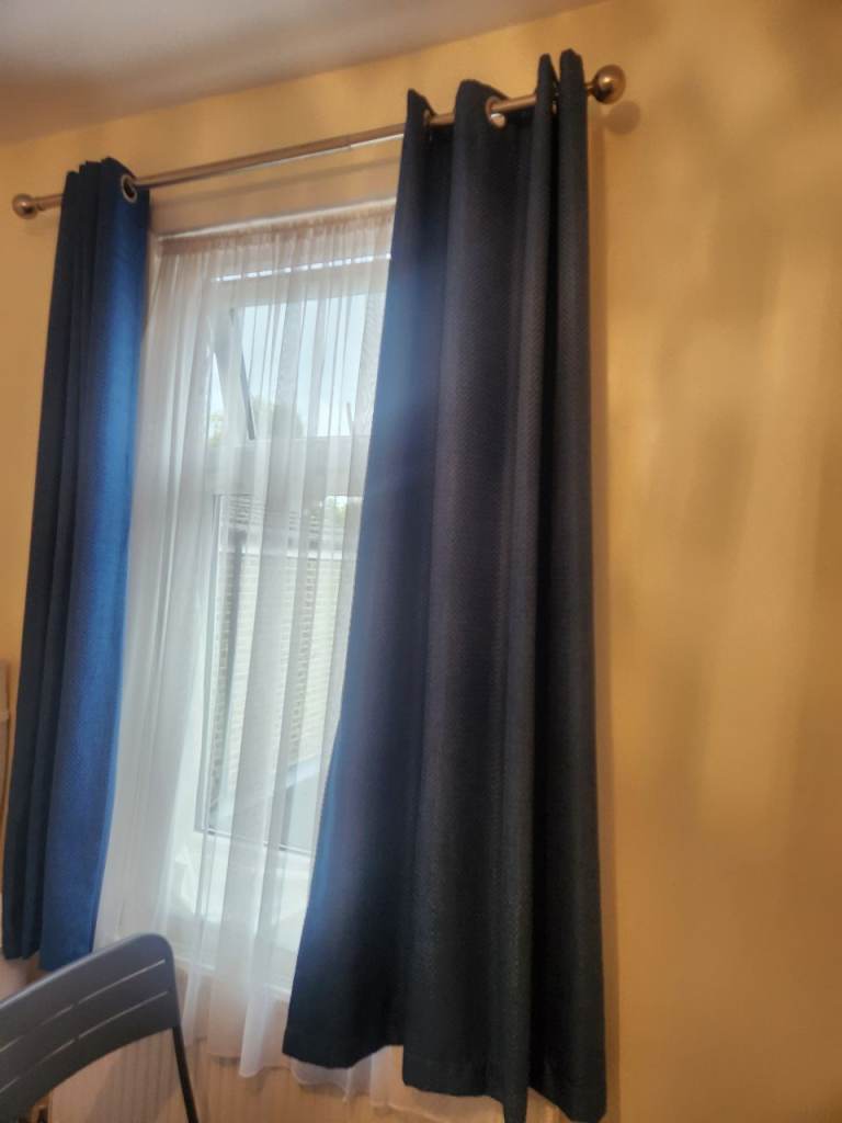 Navy  blue/ teal curtain 