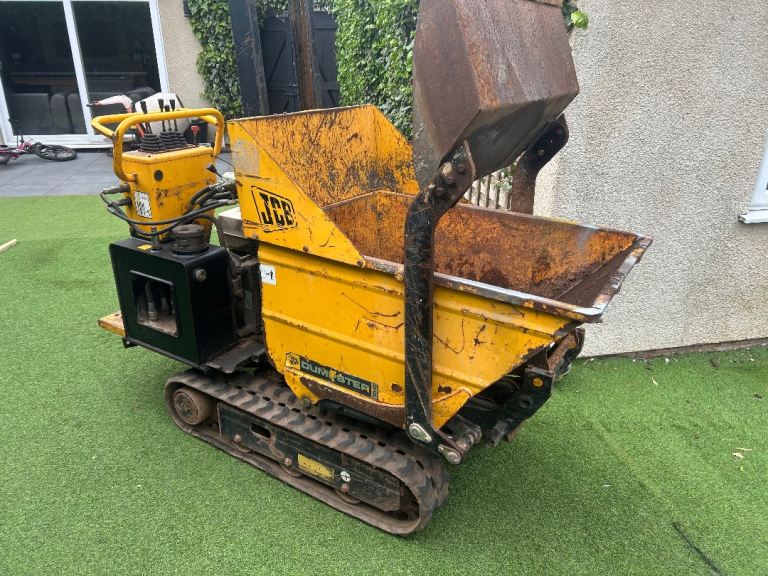 JCB petrol tracked high lift Dumper Td10 in good work in order with front loading bucket