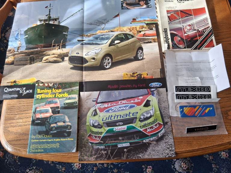 FORD Genuine posters/Mexico wing badges, Tuning book and mk2 Cortina manual book