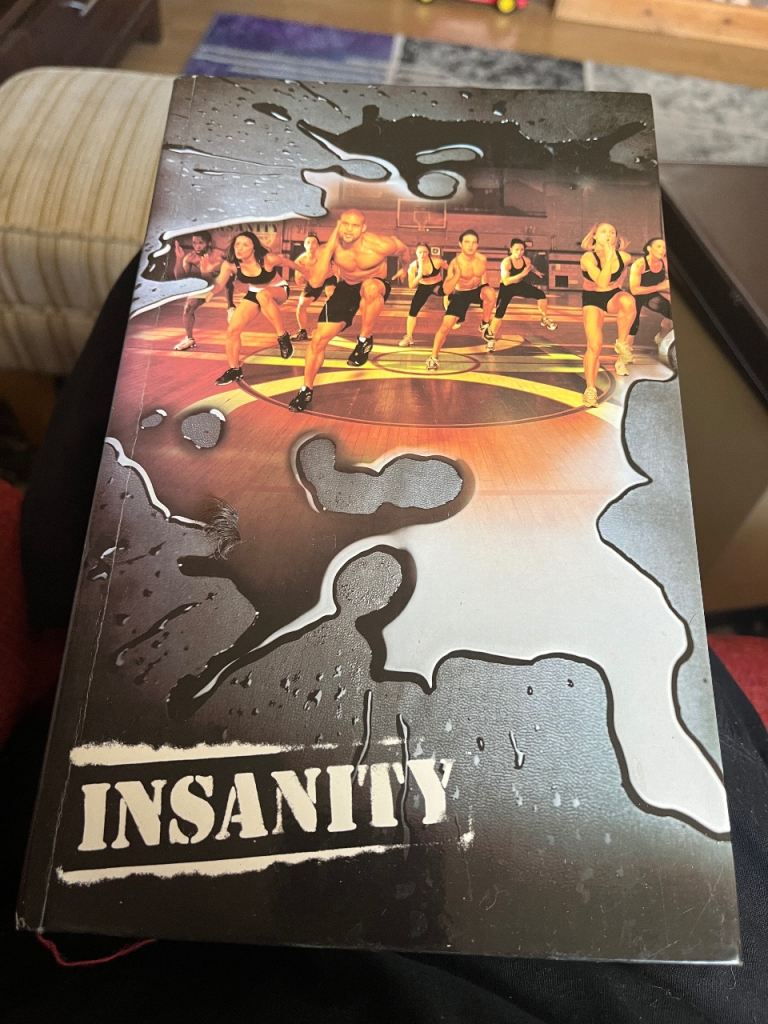 Insanity Workout Programme Book – Good Condition