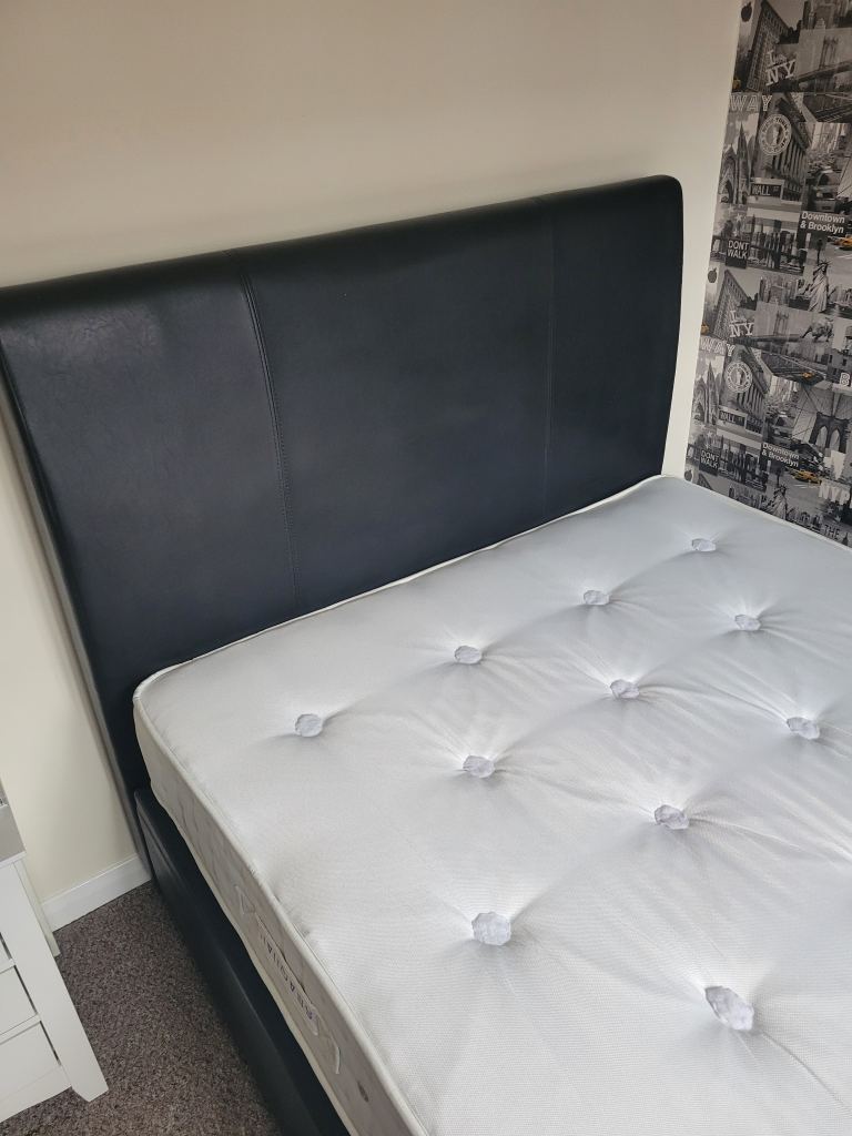 Black leather double ottoman bed for sale!