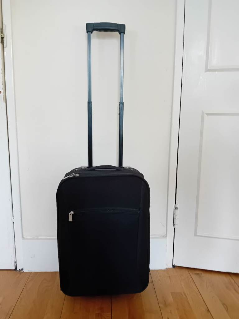Small dark navy suitcase