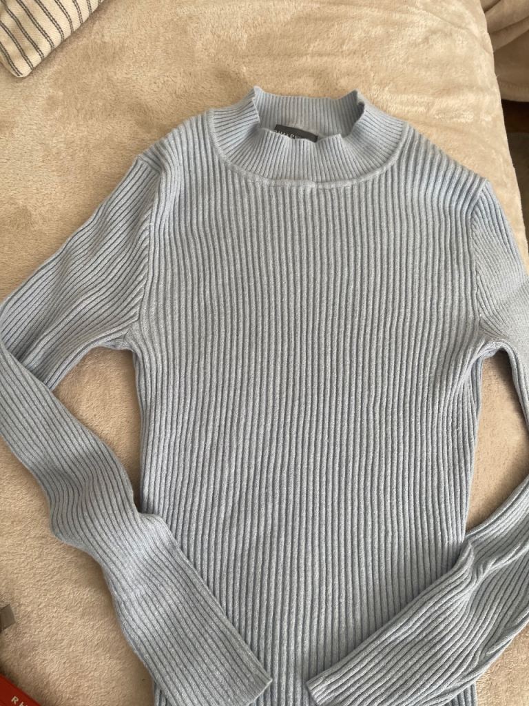 Turtle neck light blue woman’s jumper