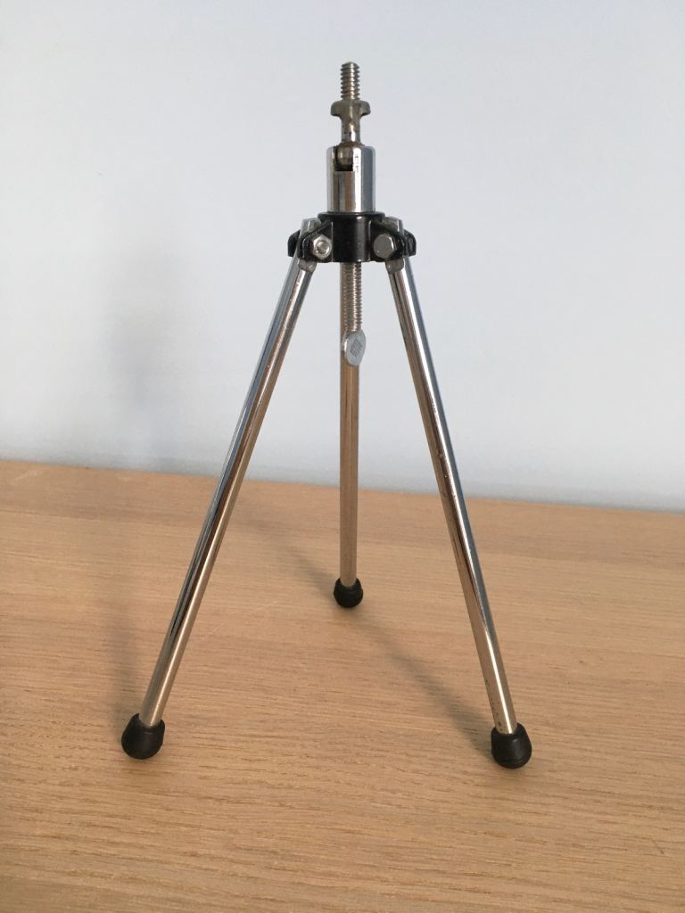 Small camera tripod for use with a vintage camera