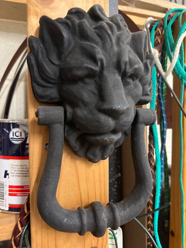 Cast iron lion door knocker
