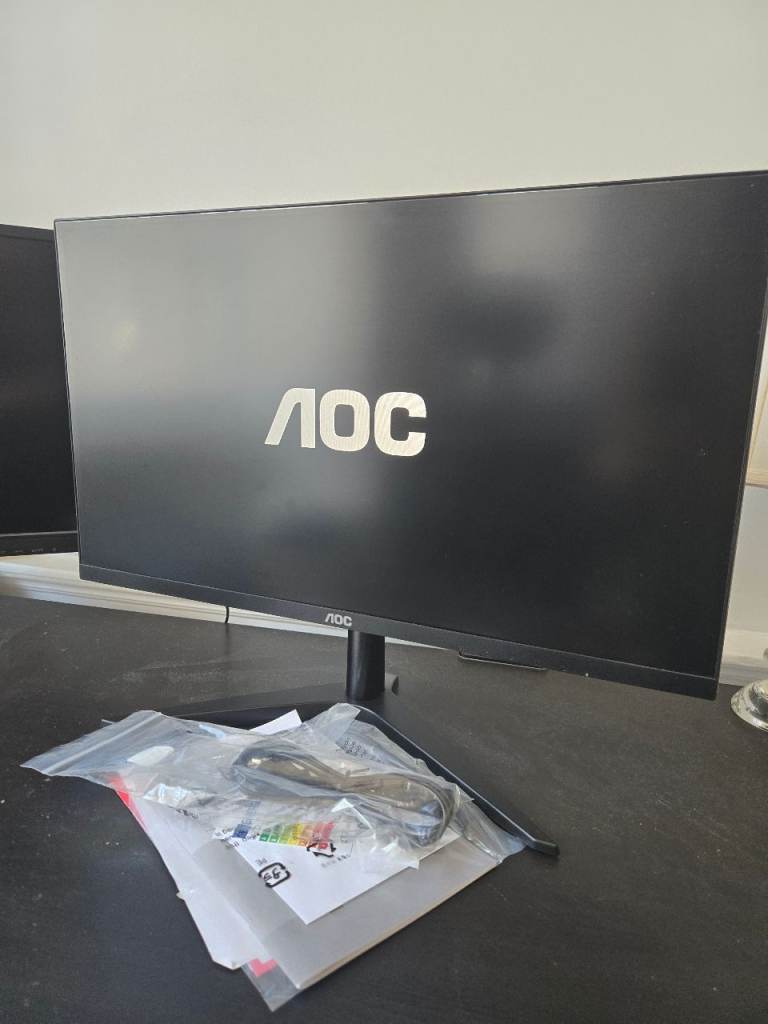 AOC Monitor with Stand and Cables – Good Condition