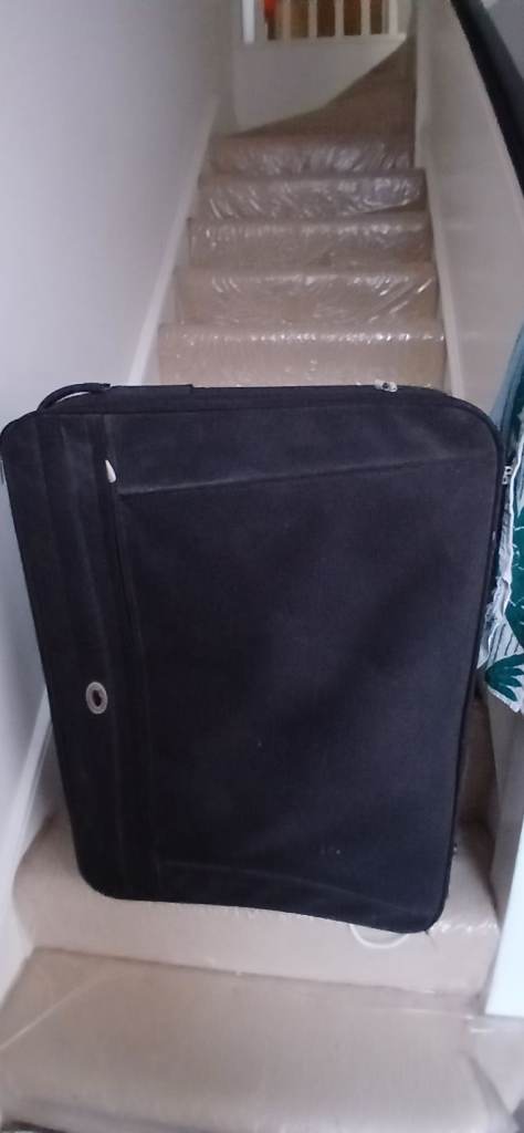 Free large suitcase with2 wheels. Lightweight 