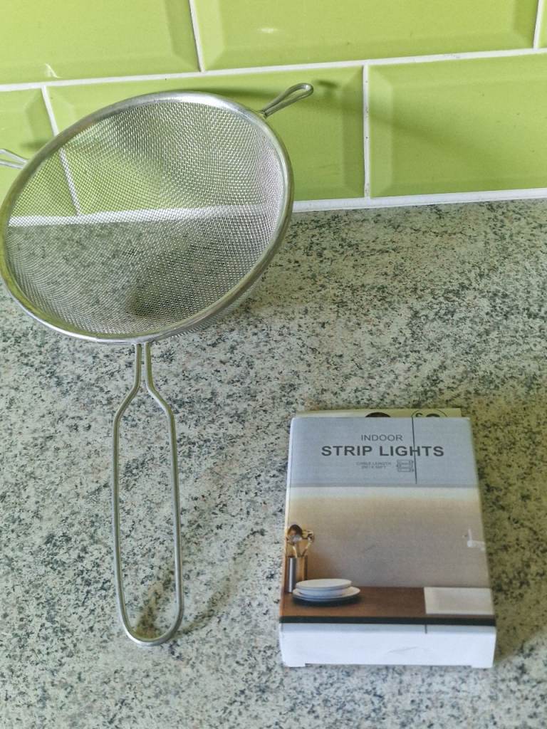 Housewares:  Indoor Strip Lights & Silver Metal Sieve