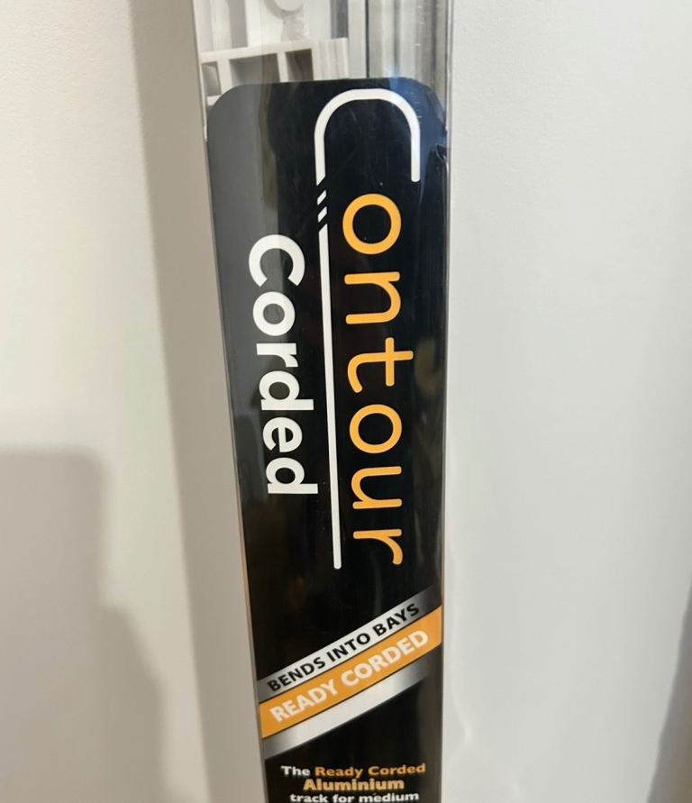 Contour corded curtain rail track