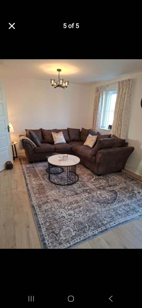 All furniture in sight for sale: Sofa, Coffee table set and Rug