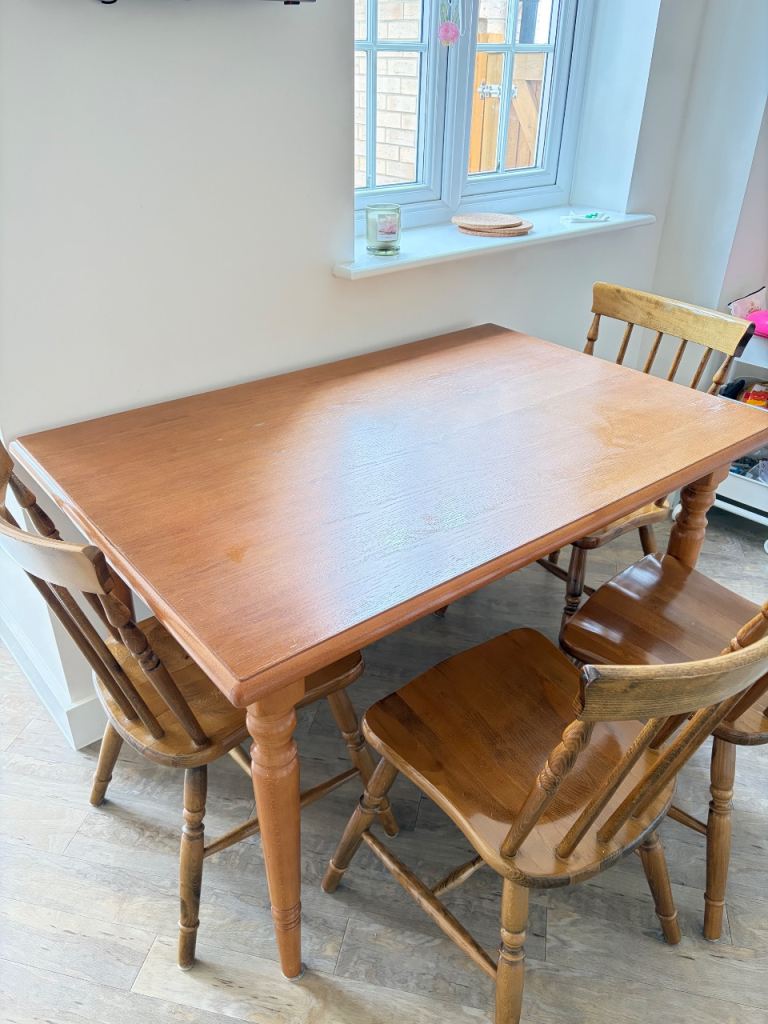 Wooden dining table and chairs 