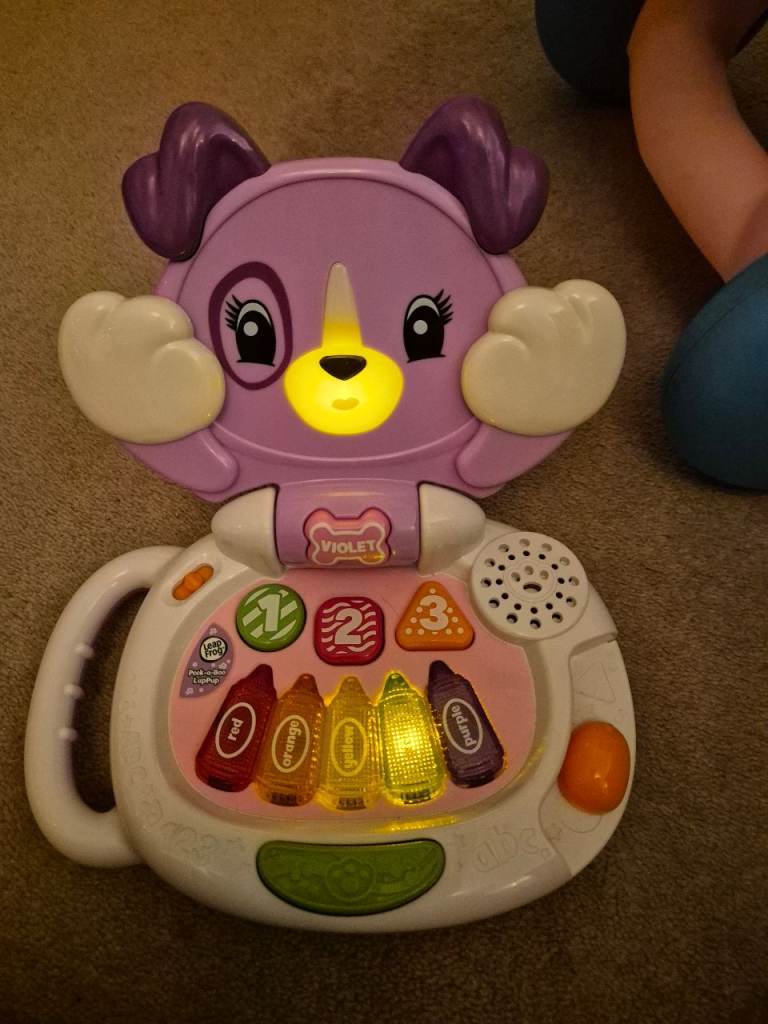 Bundle of toys and dressing gown.