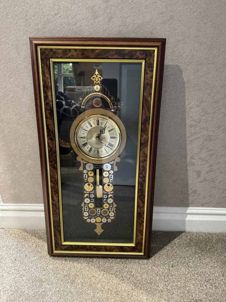 Ken Broadbent collage clock