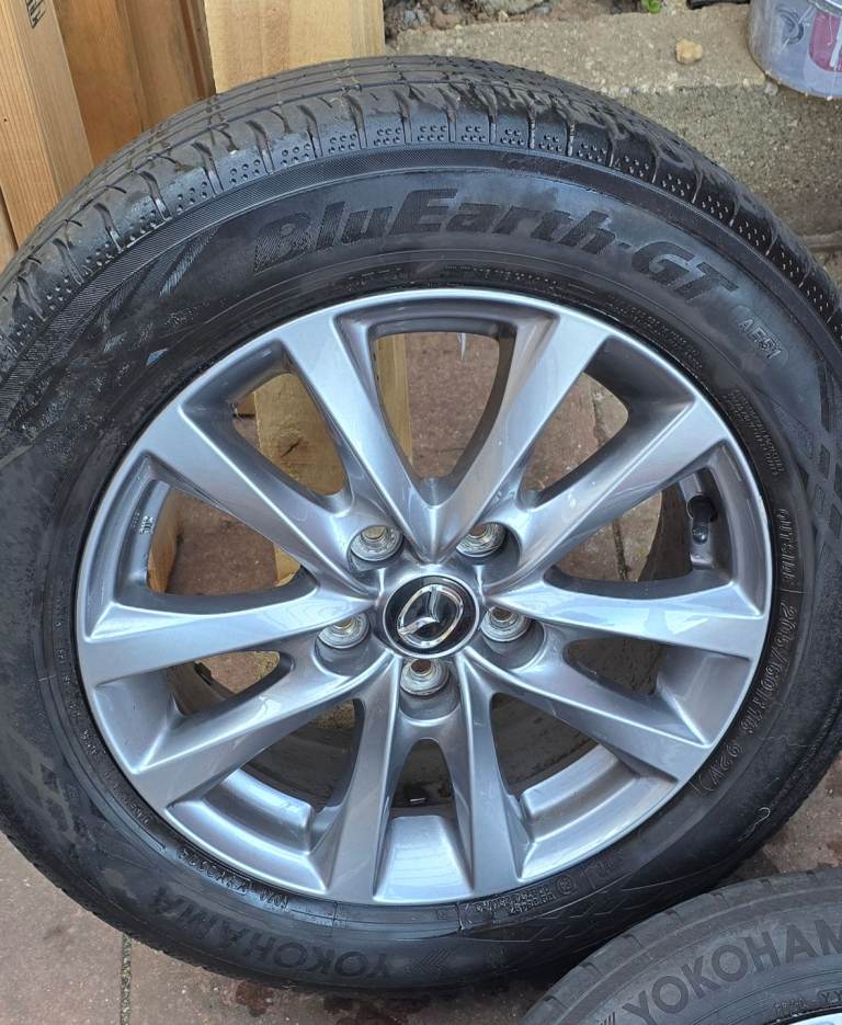 Mazda Wheels 16inch with full set of matching premium tyres (1 year old & 5 - 6mm tread)