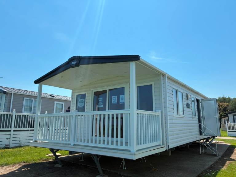 STATIC CARAVAN FOR SALE WITH SEAVIEW AND DECKING WITH 2026 & 2027 SITE FEES