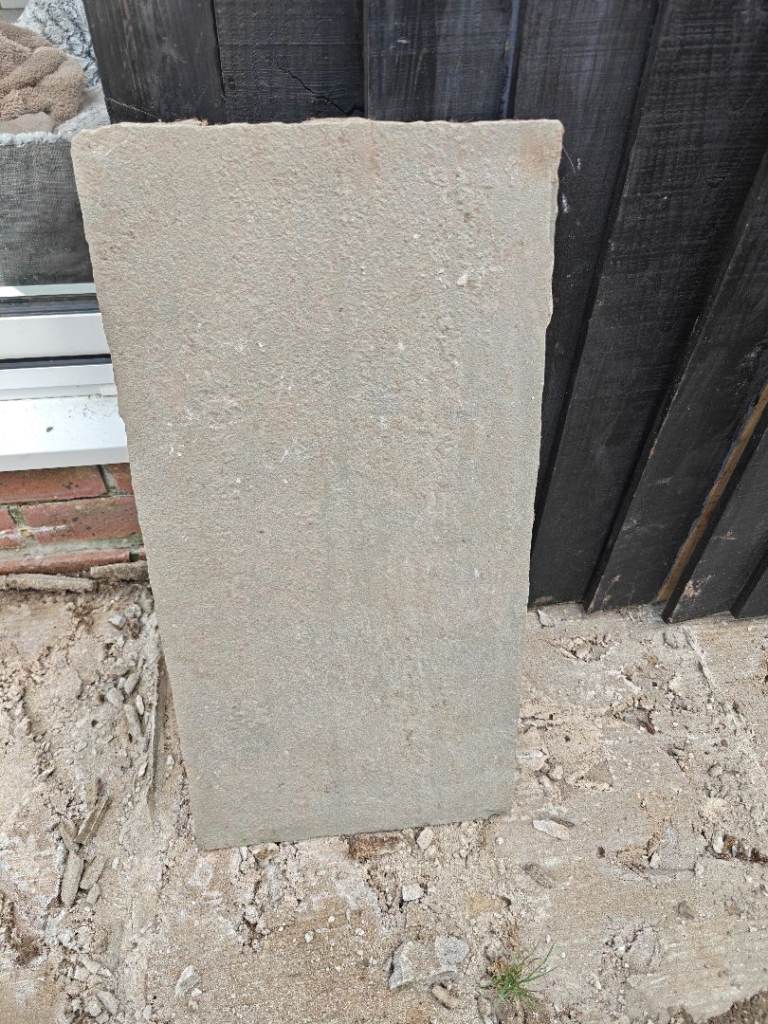 Grey Indian sandstone patio slabs 