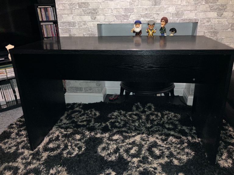 Desk in black wood can deliver for a small charge