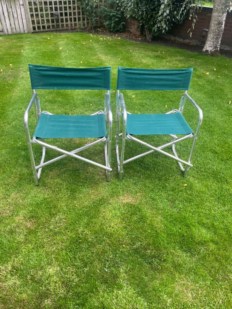 2 Wide and strong collapsible directors style chairs in green with chromed steel frame.