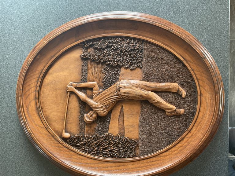 image for Wood carving of golfer