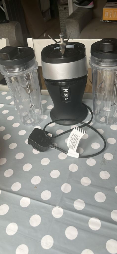 Ninja blender and two ninja travel cups 