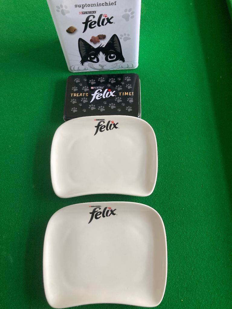 Felix cat food dishes and treat tins