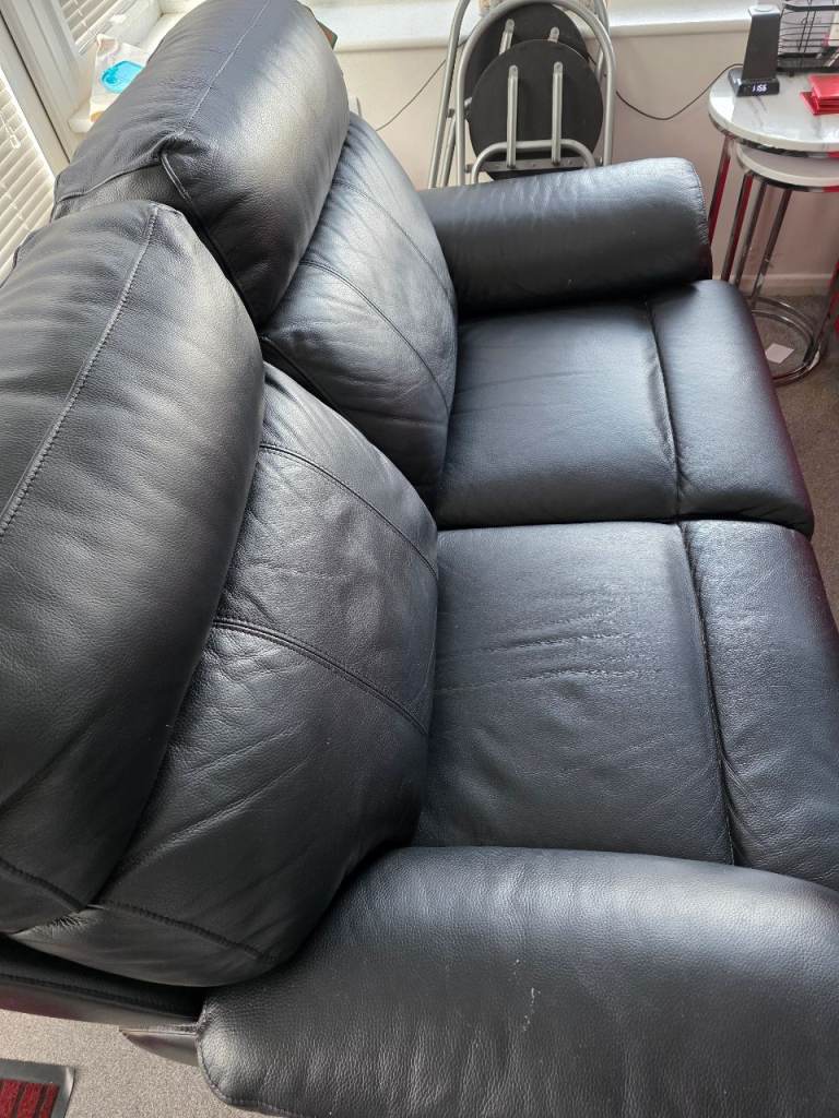 Leather Reclining Sofa
