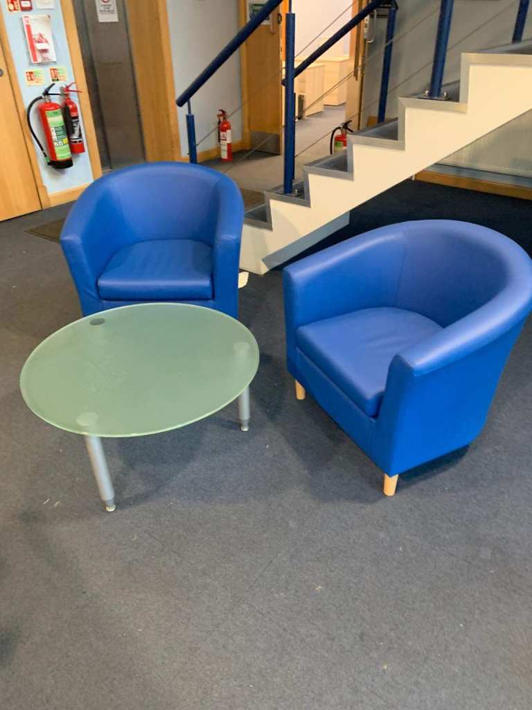 Blue Leather Tub Chairs with Glass Coffee Table
