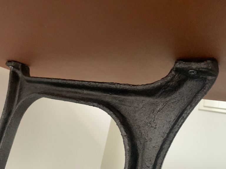 Table on Singer sewing machine stand 