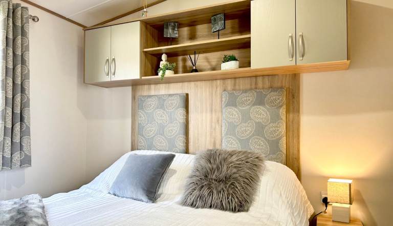 Own a caravan, repaying monthly, near Gt Yarmouth and Lowestoft