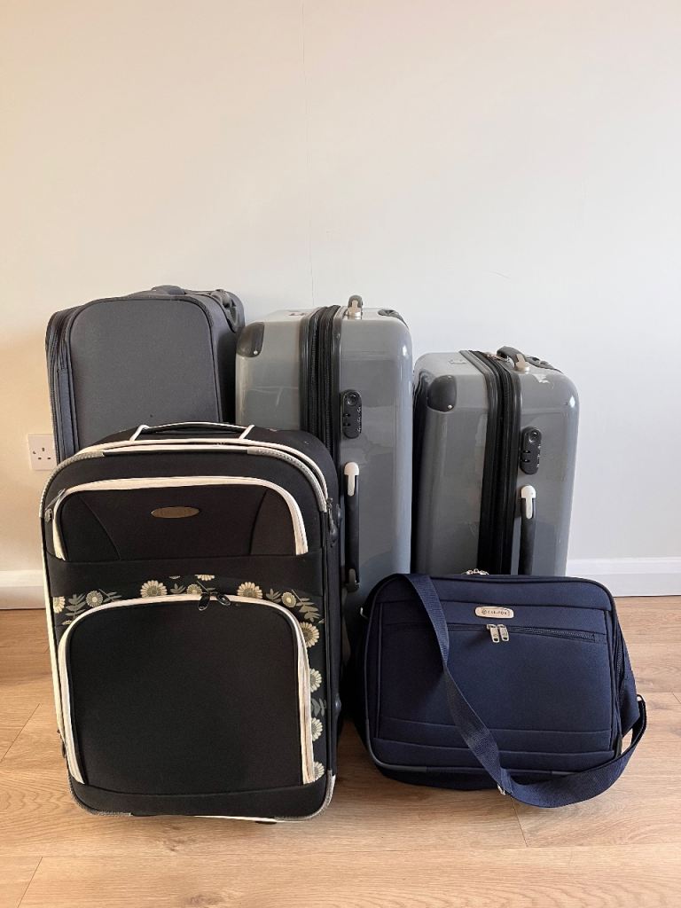 Selection of suitcases and travel bag