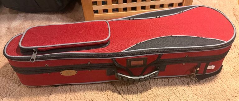 1/2 size stentor violin with music stand and bonus books.