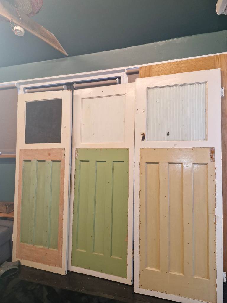 Three Original 1930's doors with glass top panel 710mm wide.