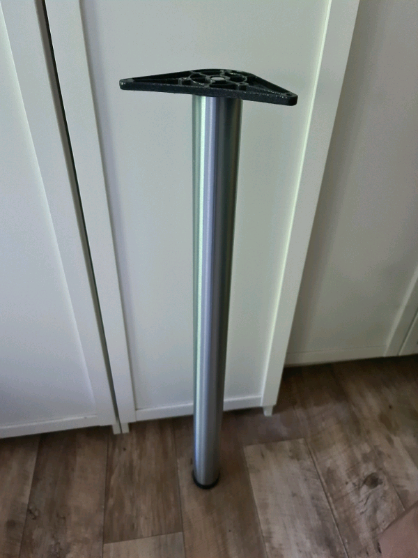 Single, height adjustable, brushed chrome finished leg.