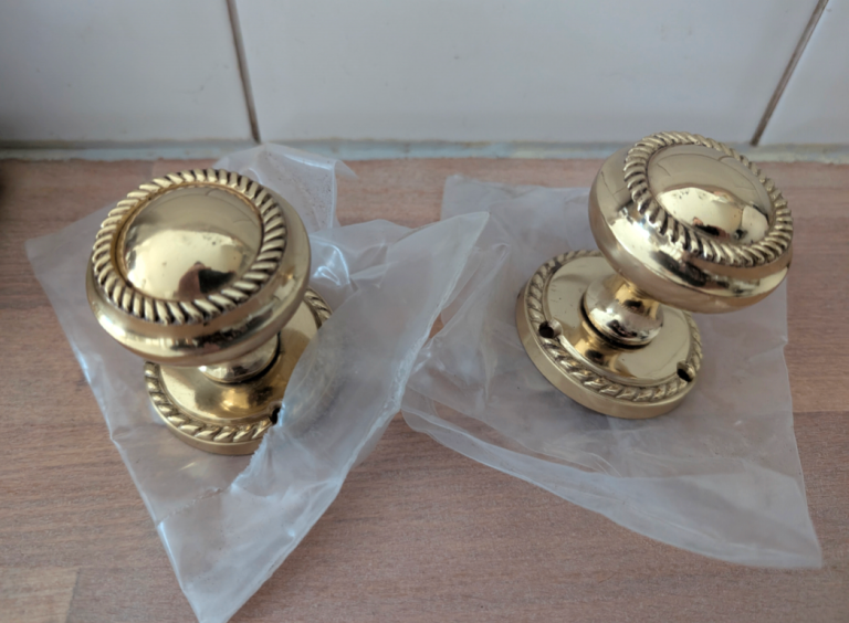 New Georgian brass rope style door knobs