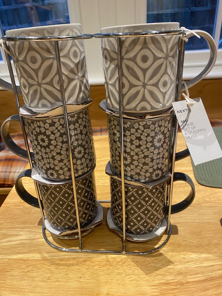 Brand new stacking mugs with tags