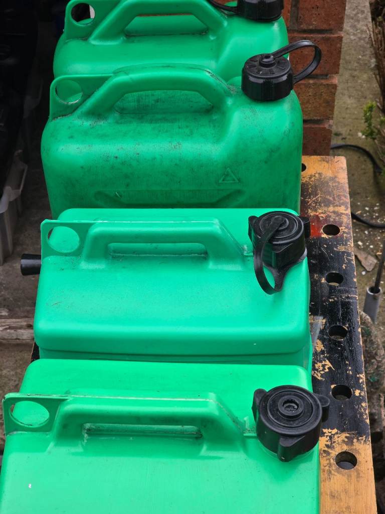 Four Green Plastic Jerry Cans for Fuel or Water – Good Condition