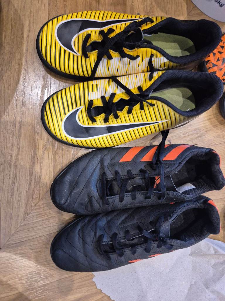 1x nike 
1x adidas 

Football boots the yellow one Nike is in very good condition and there's a size